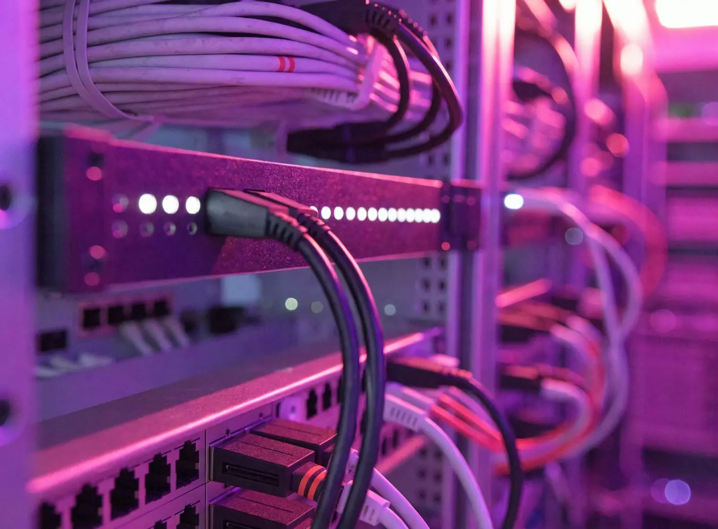 Network rack with a rackmount video encoder and tidy ethernet cabling in a technical room