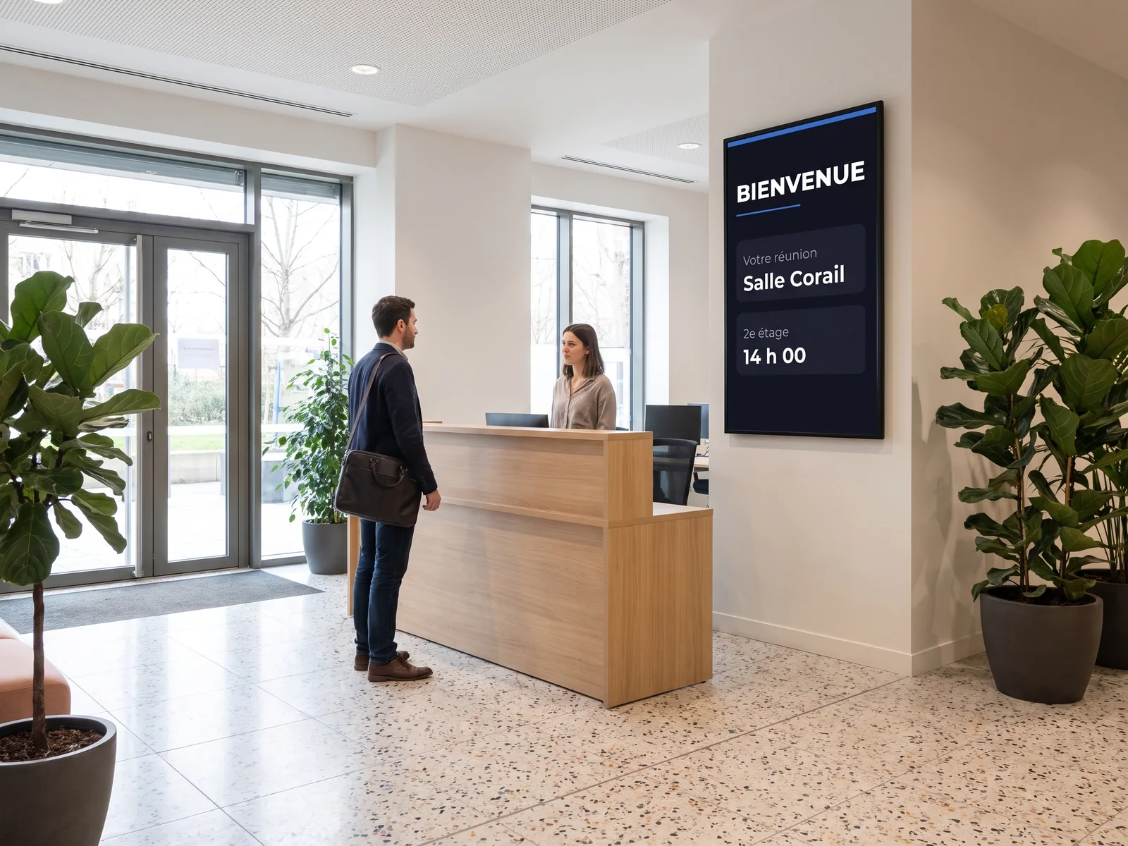 Écran portrait à l'accueil d'un centre d'affaires indiquant une salle de réunion et son horaire