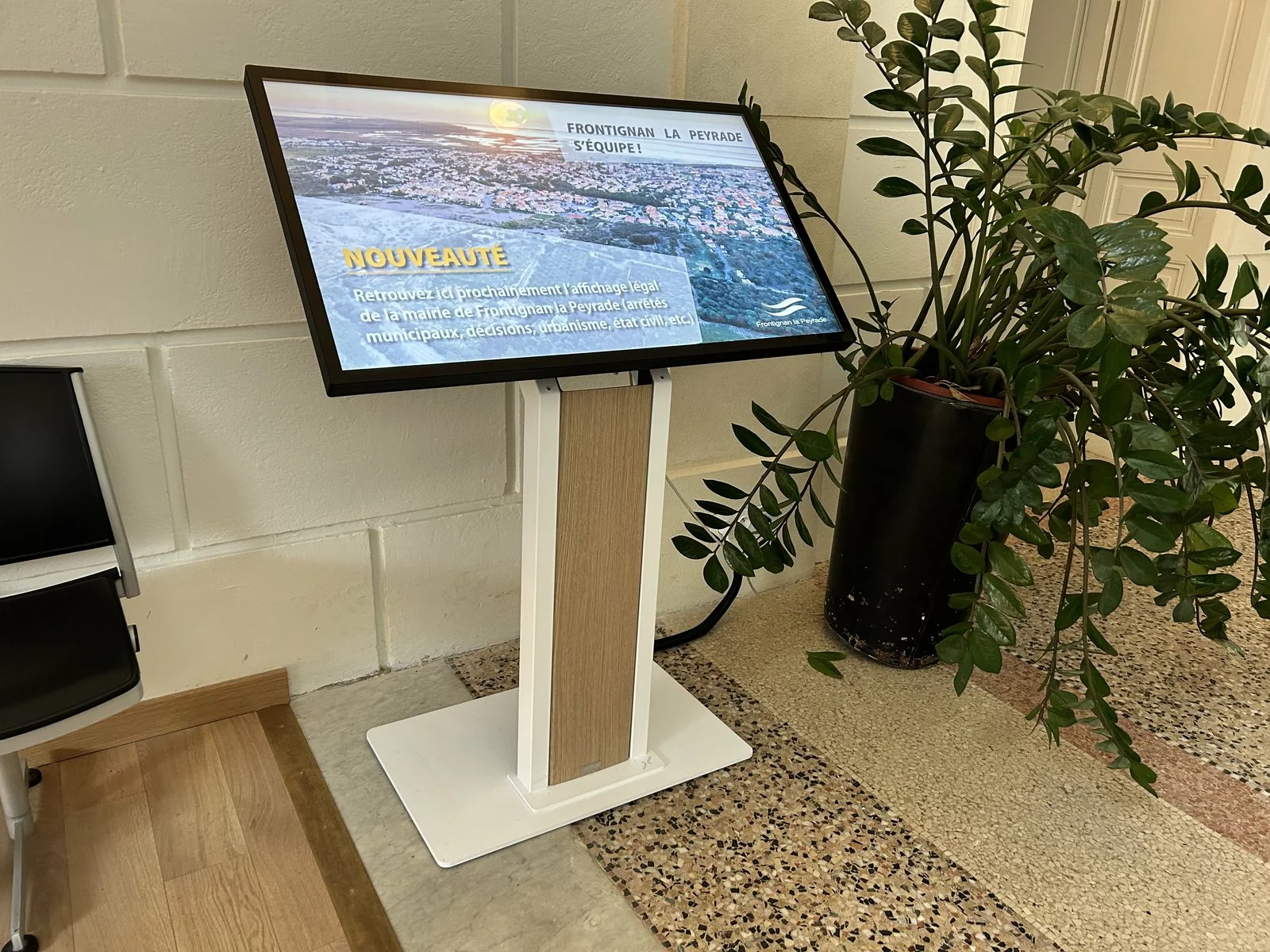 Statutory display kiosk installed in the lobby of Frontignan la Peyrade town hall, France