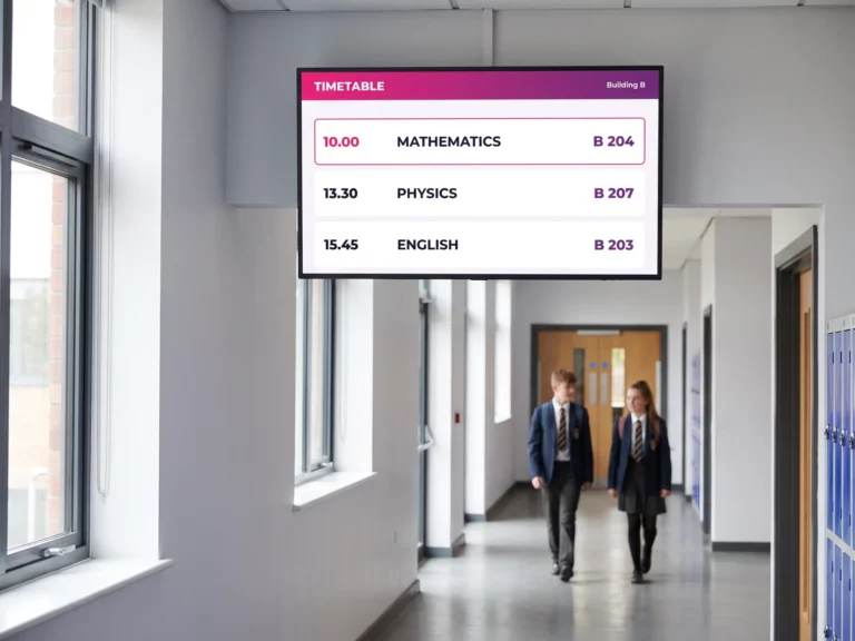 Screen showing today's timetable and room numbers in a school corridor