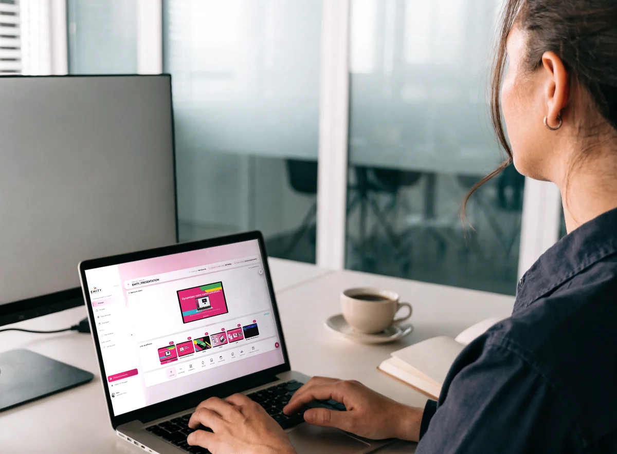 The E-MANAGER platform on a laptop: editing the playlist shown on meeting room screens