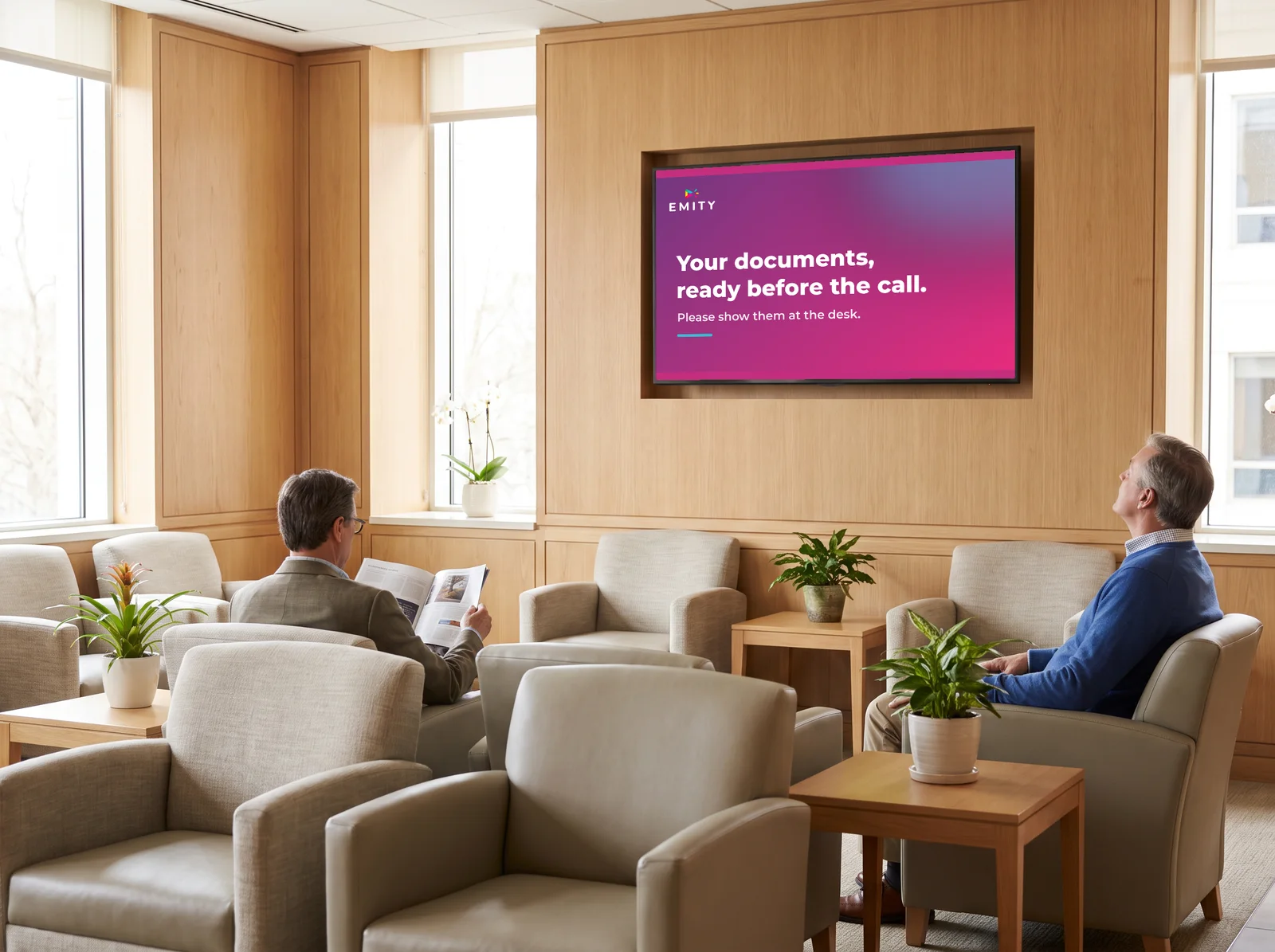 Medical centre waiting room: the wall screen reminds patients to have their documents ready before their call